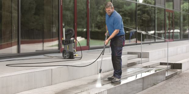 Karcher pressure washer cleaning sidewalk