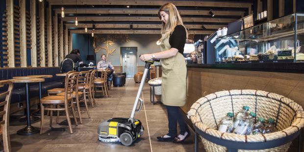 Cleaning hospital cafeteria with Karcher compact floor scrubber