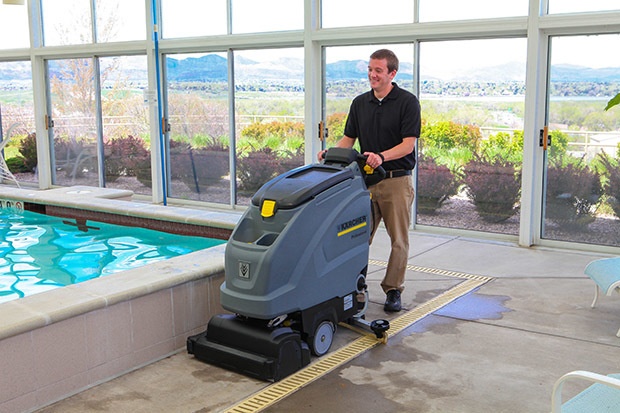 Cleaning pool deck with Karcher B 40 walk-behind scrubber