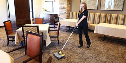 Sweeping dining area with a Windsor Karcher Group Radius Mini 12