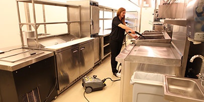 Cleaning kitchen with Karcher steam cleaner