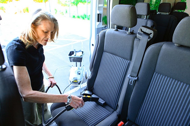 Cleaning car upholstery with Karcher SG 4/4 steam cleaner
