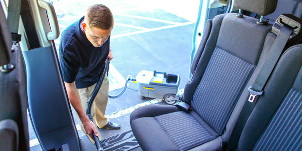 Cleaning upholstery with a Karcher Puzzi compact carpet extractor