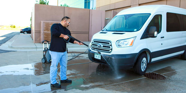 Cleaning truck exterior with Karcher pressure washer
