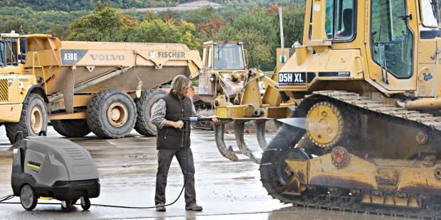 Karcher pressure washer cleaning construction equipment