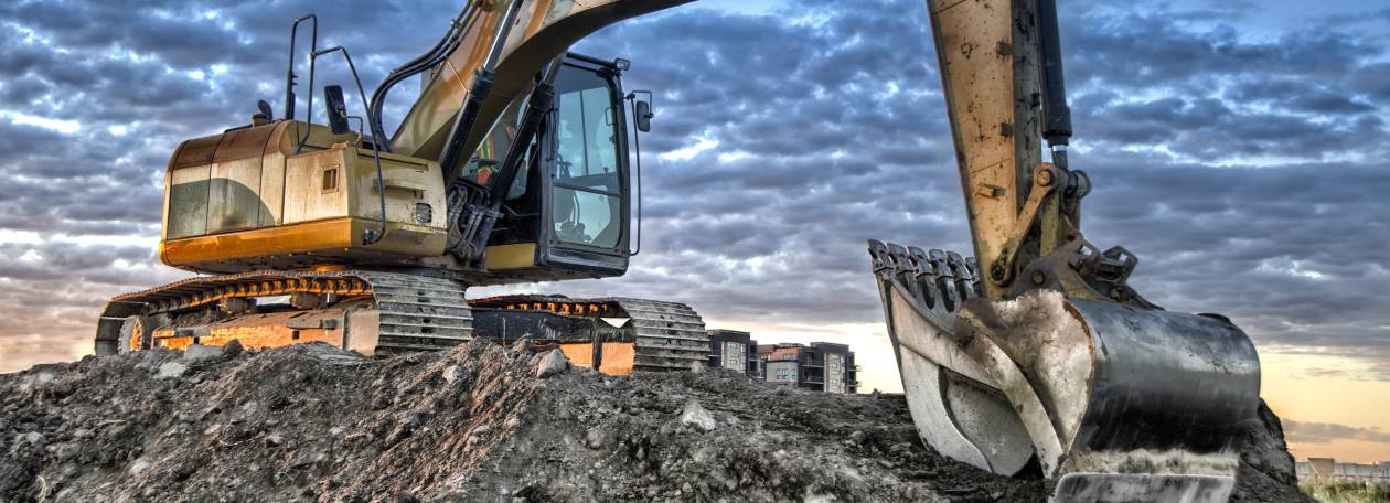 Construction excavator ready to be cleaned by Karcher pressure washers