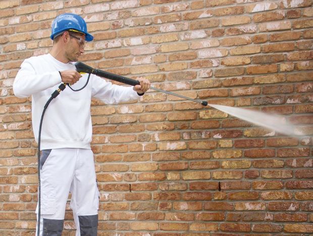 Pressure Washer used on exterior building Using a Landa pressure washer to clean exteriors