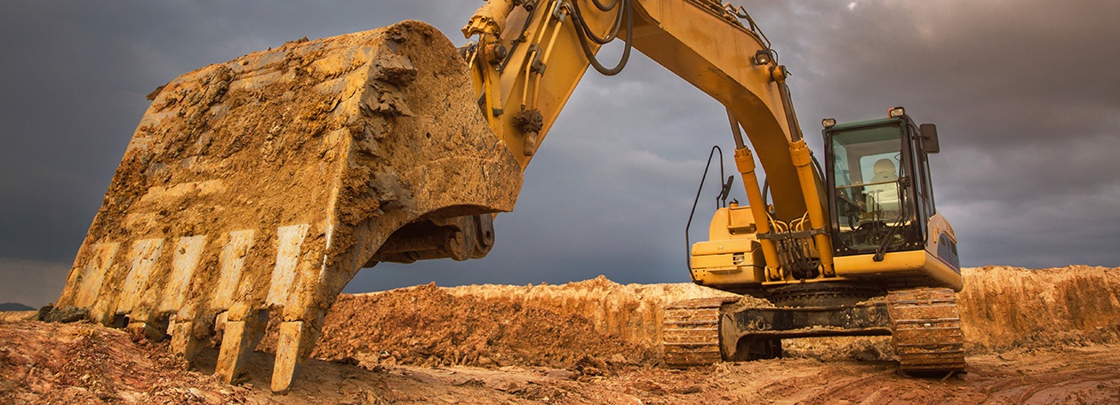 Construction Solutions - 1260x456 Construction excavator needing to be cleaned by a Landa pressure washer