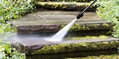 Cleaning mossy paving slabs