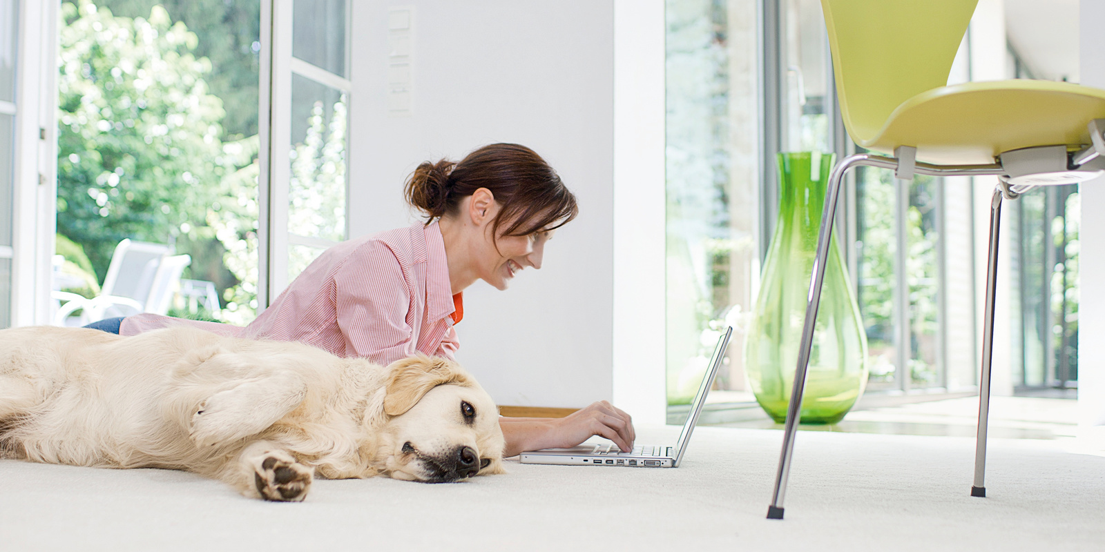 Karcher Customer Woman on Laptop with Dog Karcher Customer Woman on Laptop with Dog