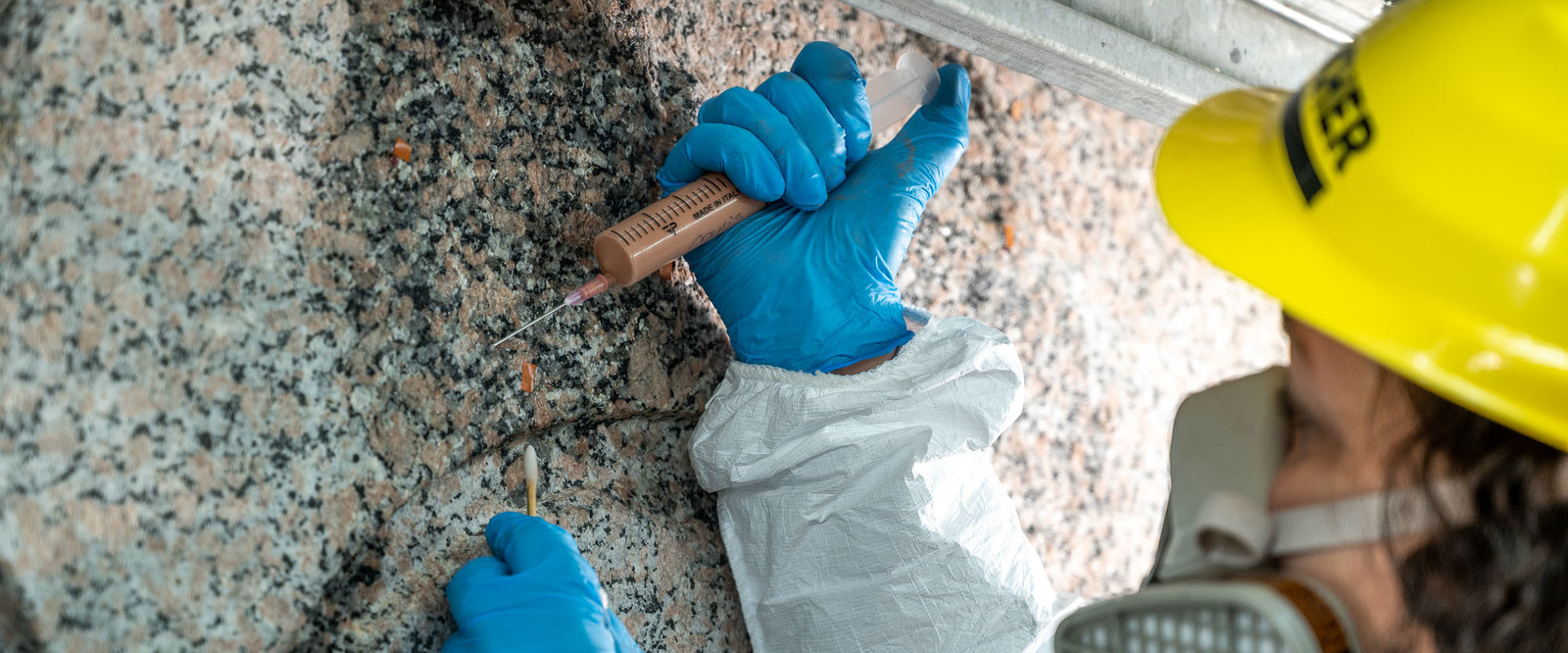 Damaged areas on the obelisk are being strengthened by restorers. Damaged areas on the obelisk are being strengthened by restorers.