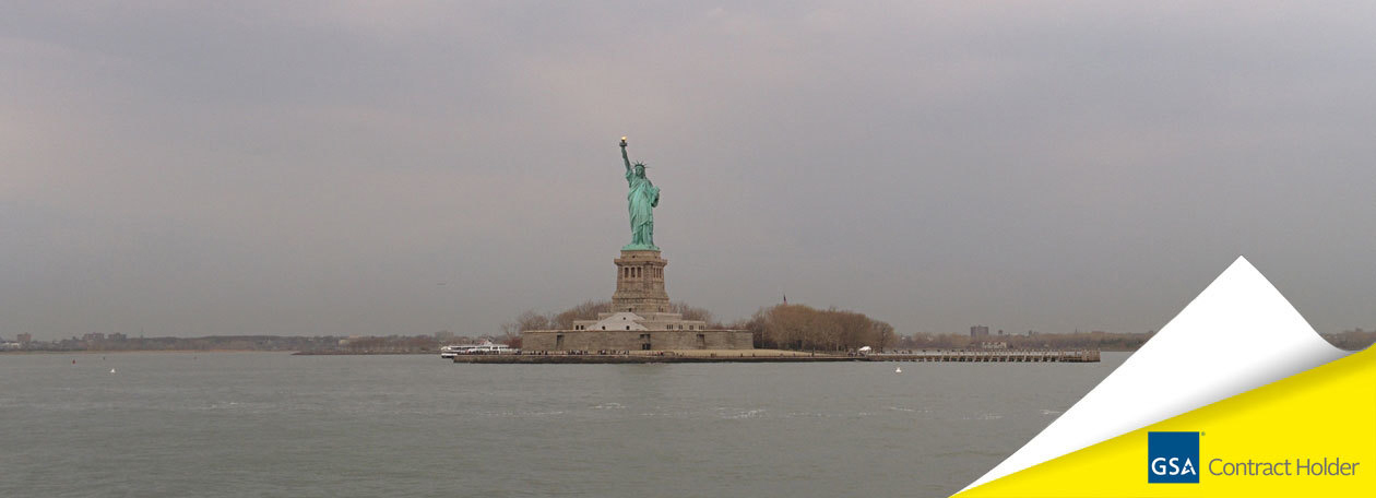 GSA Contract Holder Photo of the Statue of Liberty with the GSA logo in the bottom right corner