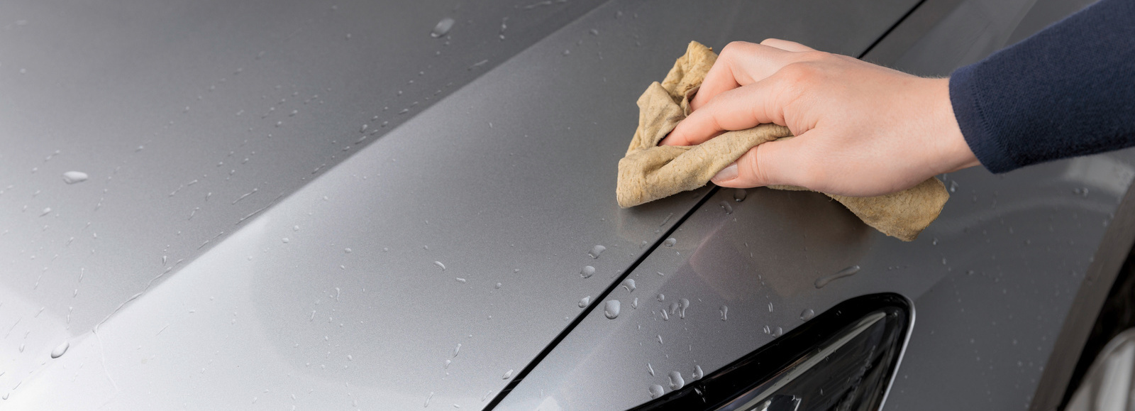 Car is dried with a leather cloth