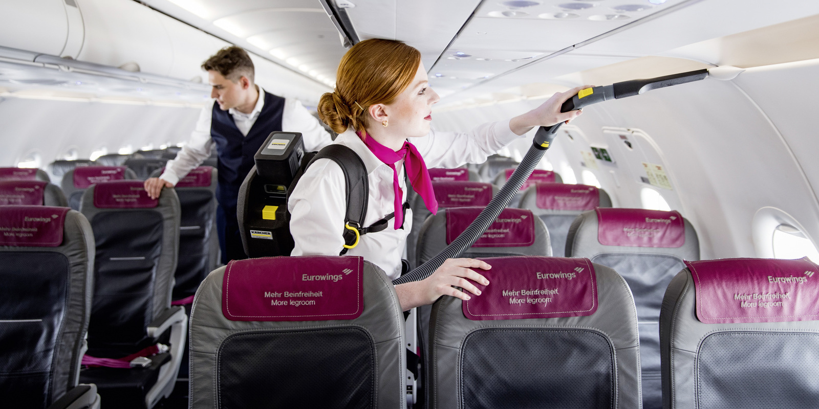 Cleaning an aircraft with a battery-powered backpack vacuum Cleaning an aircraft with a Kärcher battery-powered backpack vacuum
