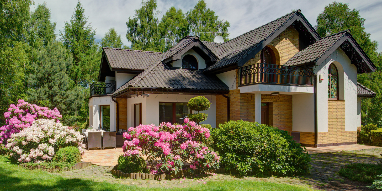 a Man cleaning a motorbike with pressure washer