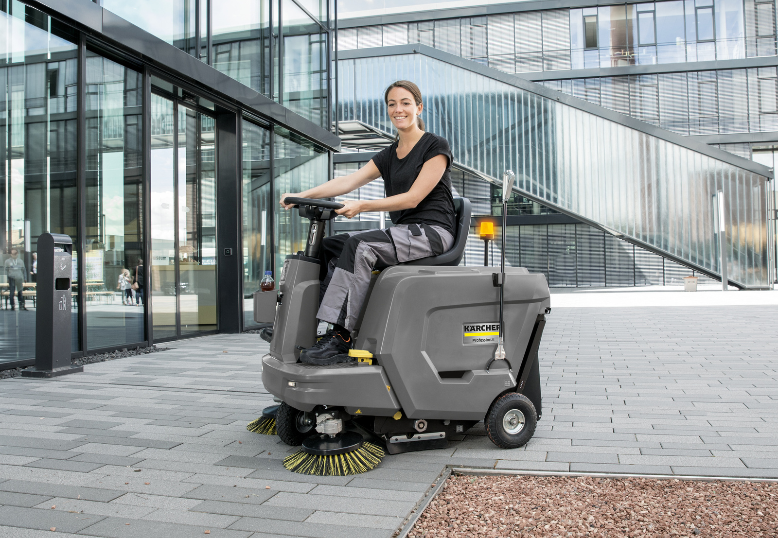 Ride-on sweeper for large areas for forecourt cleaning Ride-on sweeper for large areas for forecourt cleaning