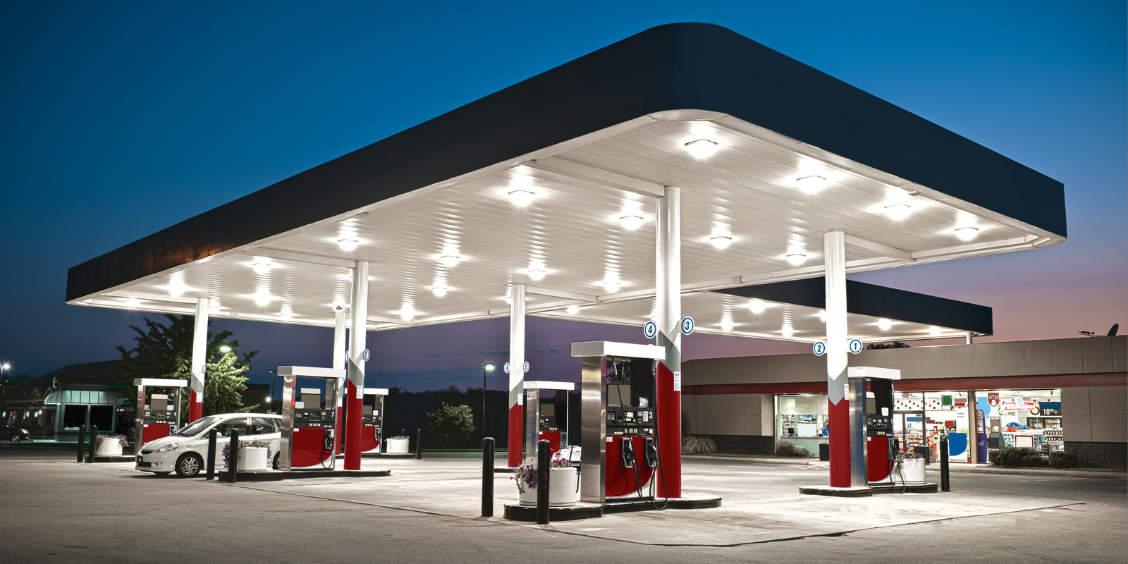 Cost-effectiveness of filling station gantry car washes