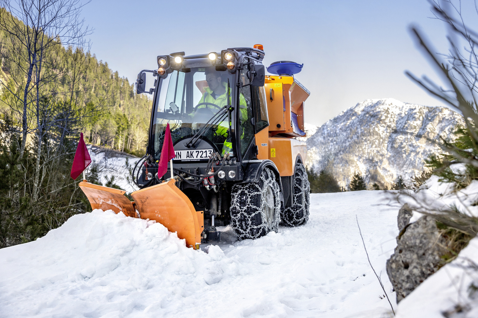 Pay-per-use for seasonal tasks A snow plough clears the snow in a mountainous area