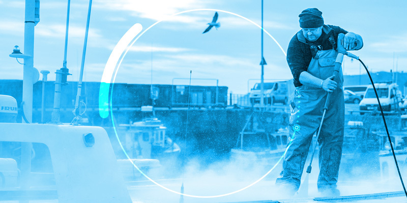 Illustration of a man pressure washing at a marina
