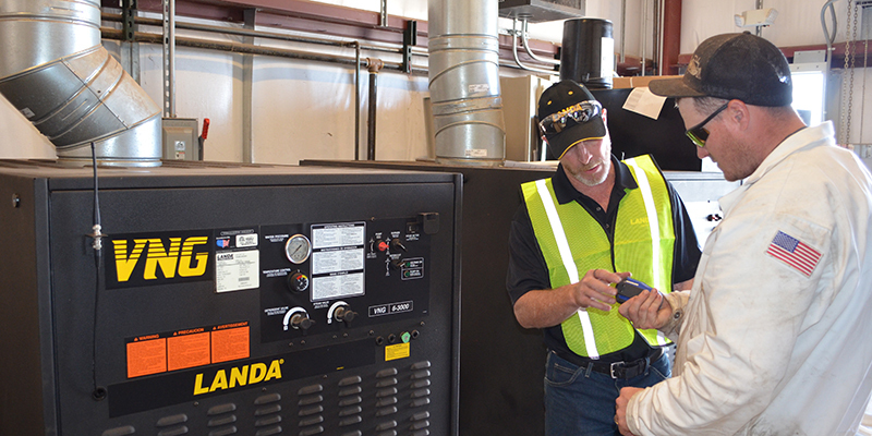 On-Site Service & Repair A Landa dealer service technician talks about Lancom Remotes with a field technician