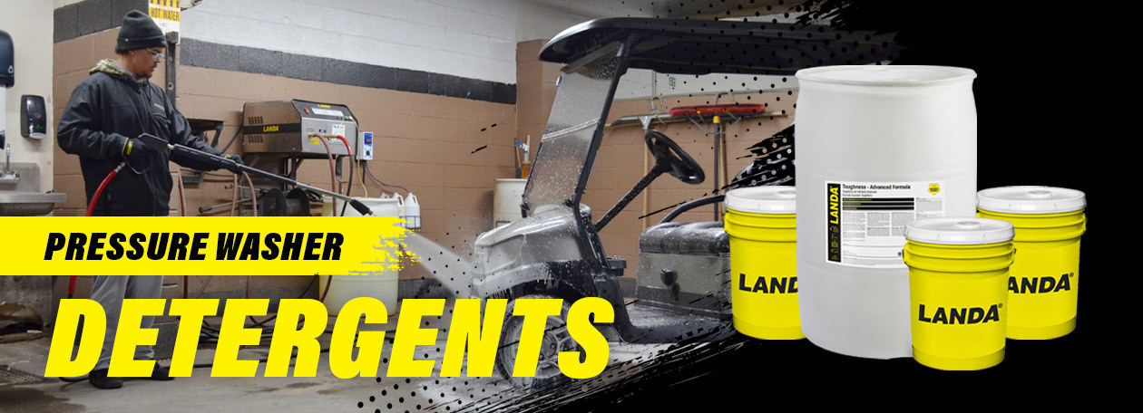 Landa detergents A worker cleans a golf cart using Landa detergents