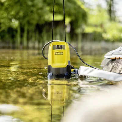 Pond pump outlet cleaning