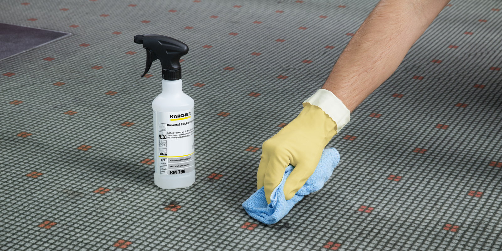 Carpet cleaning A stain being removed from a carpet using a universal cleaner