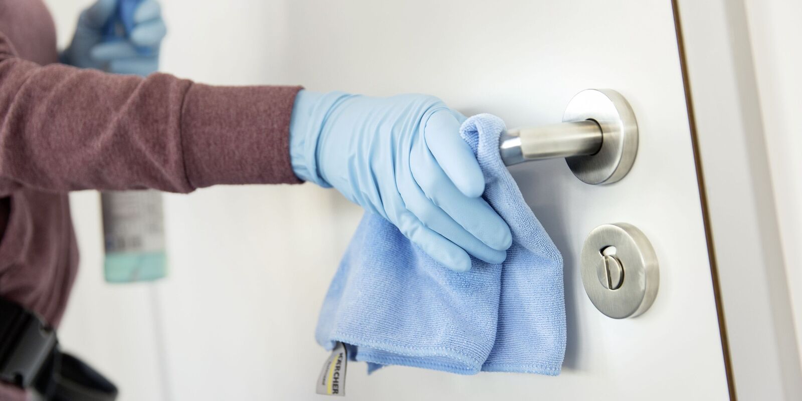 Door handle cleaning A door handle being cleaned