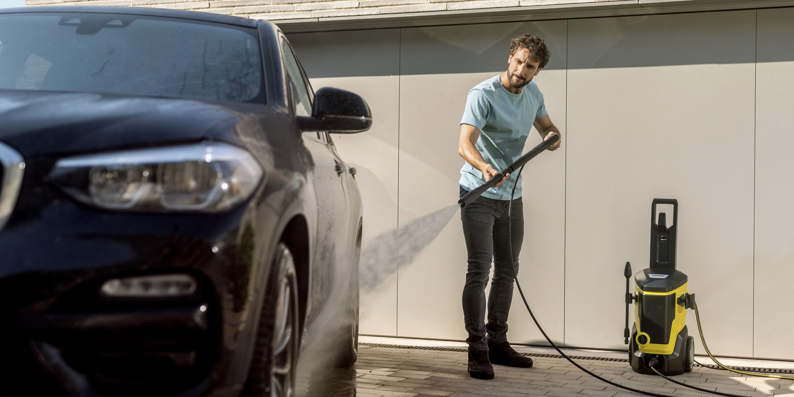 A man washing his car