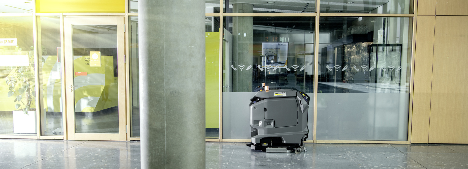 Scrubber dryer robot A scrubber dryer robot in use