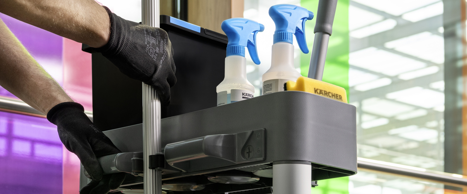 Surface cleaner A person holds a Kärcher surface cleaner in their hand