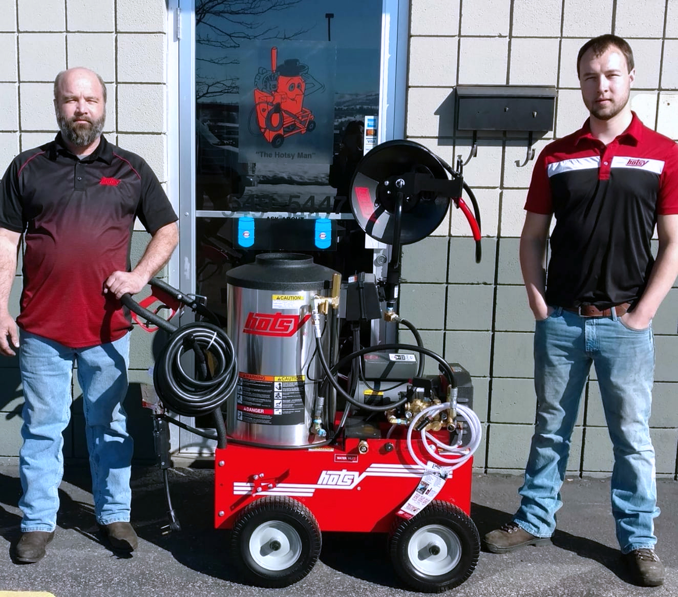 Craig & Zachary Jantz - Hotsy of Western Montana portrait of Craig & Zachary Jantz next to a Hotsy pressure washer