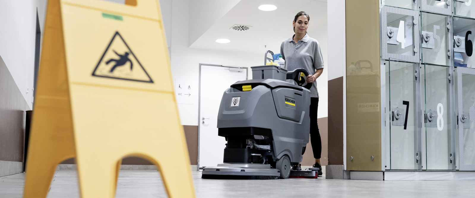 Floor cleaning in a senior care home A woman is cleaning the floor of a senior care home