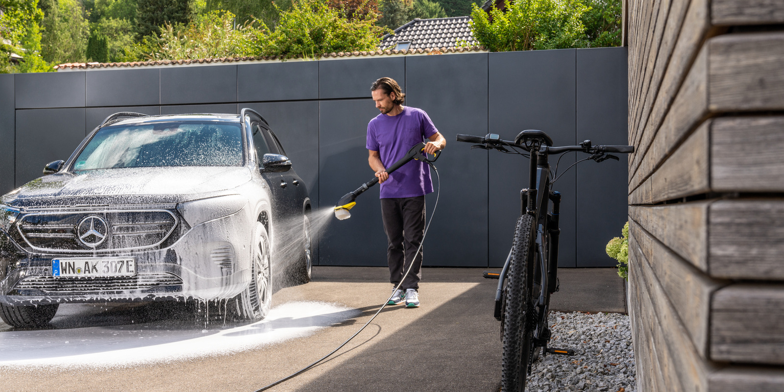 A man washing his car