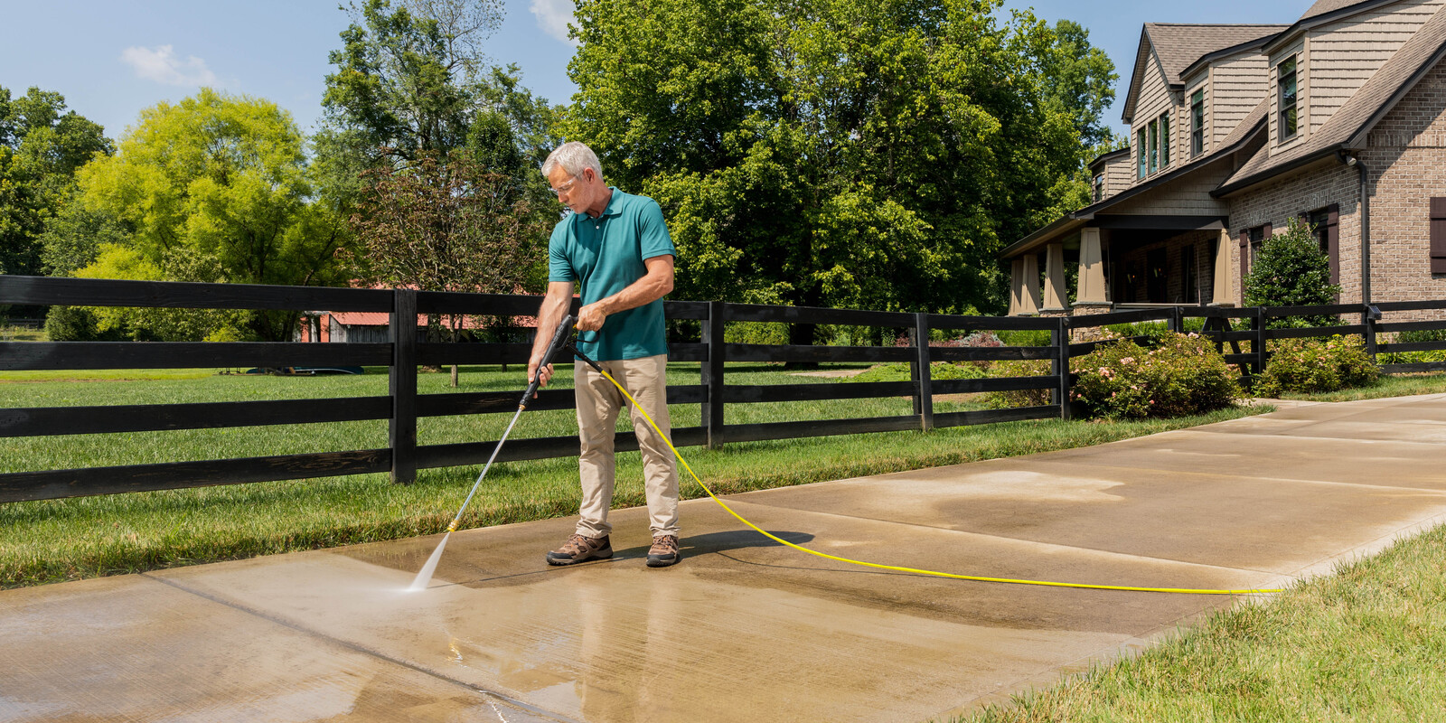 Karcher Gas Pressure Washer Cleans Concrete Driveway