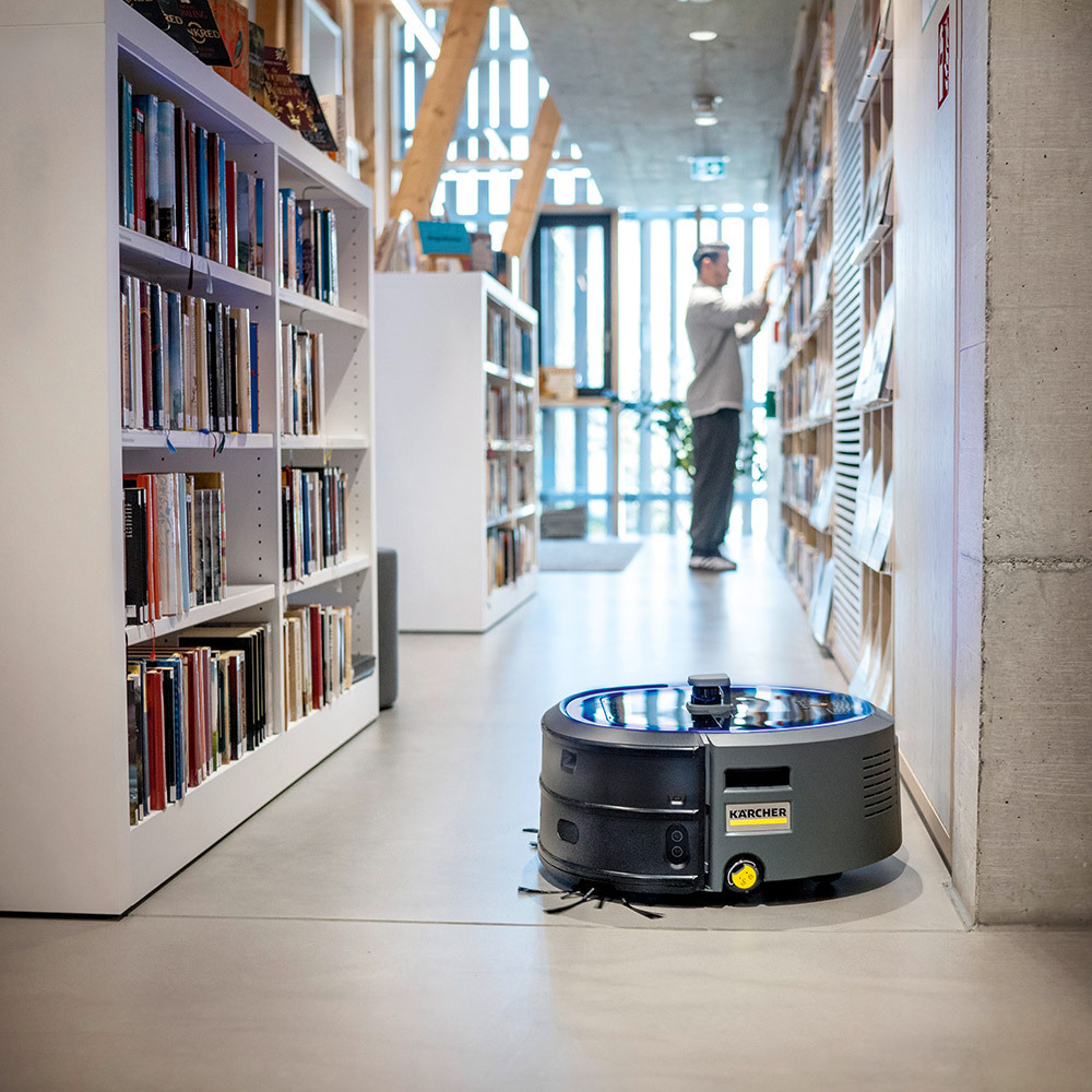 KIRA CV 50 Robotic Vacuum A KIRA CV 50 Robotic Vacuum cleans in a library.