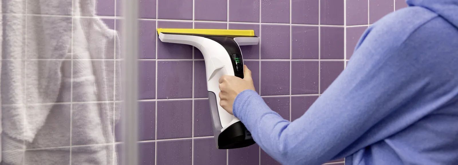 Squeegeeing the shower with the Window Vac Squeegeeing the shower with the Kärcher Window Vac