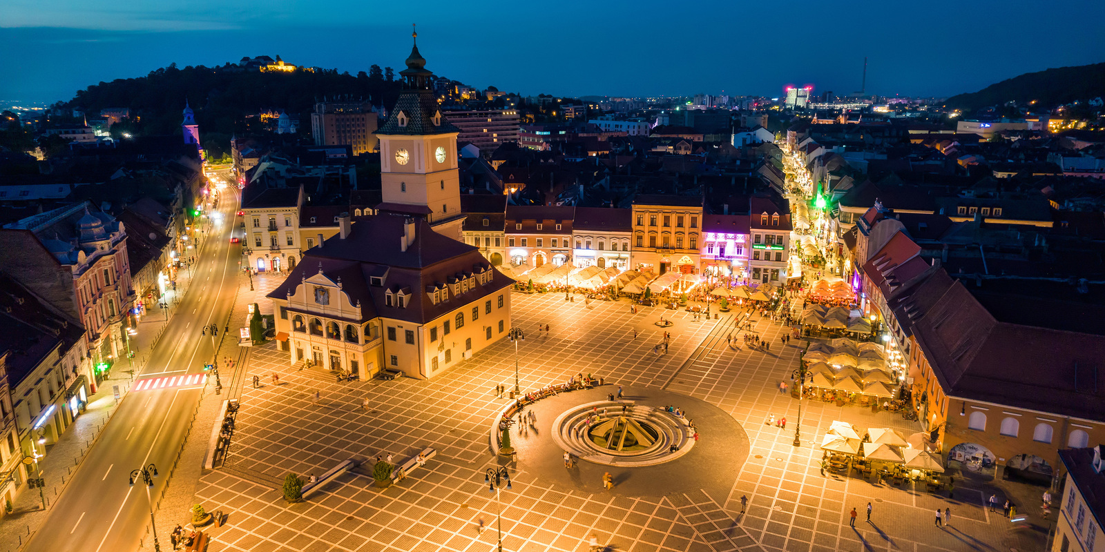 aerial-drone-view-council-square-brasov-night-romania. aerial-drone-view-council-square-brasov-night-romania.