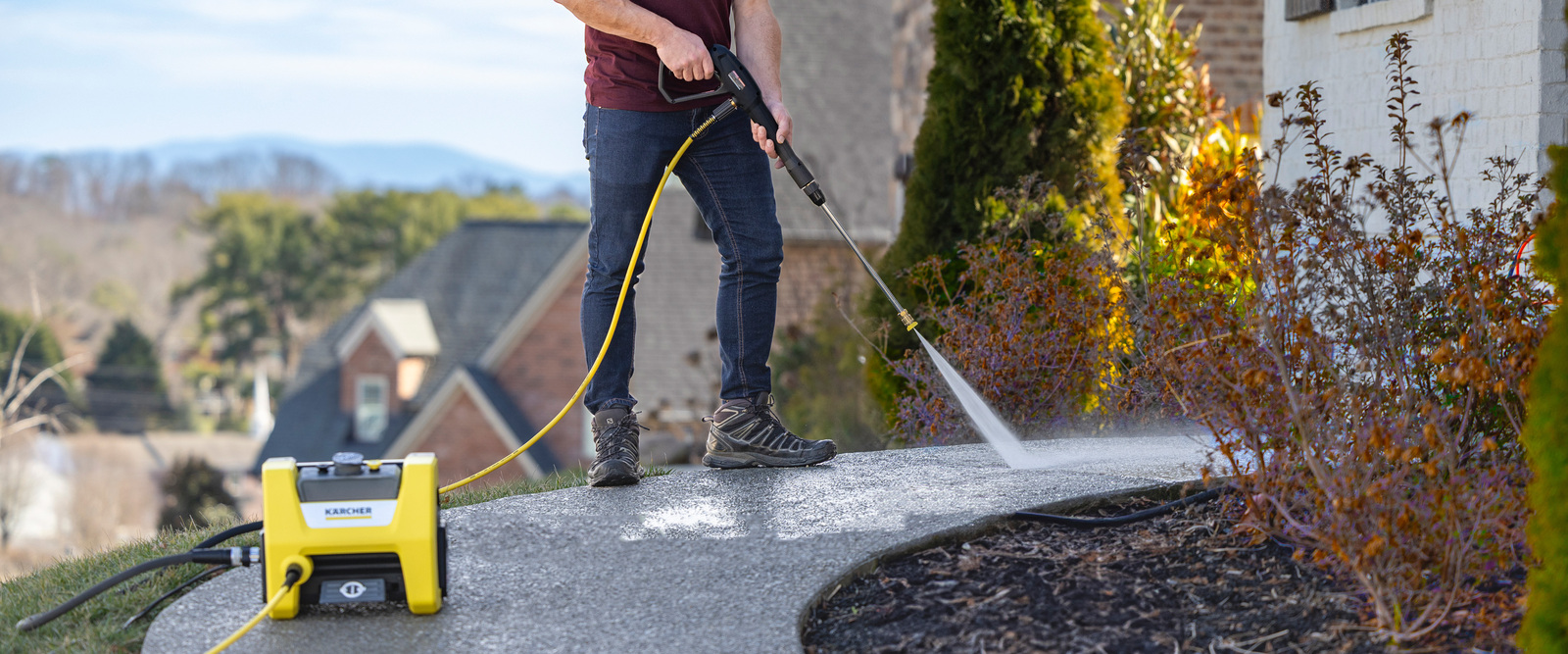Karcher K1800PS Cube Pressure Washer Cleans Sidewalk Karcher K1800PS Cube Pressure Washer Cleans Sidewalk