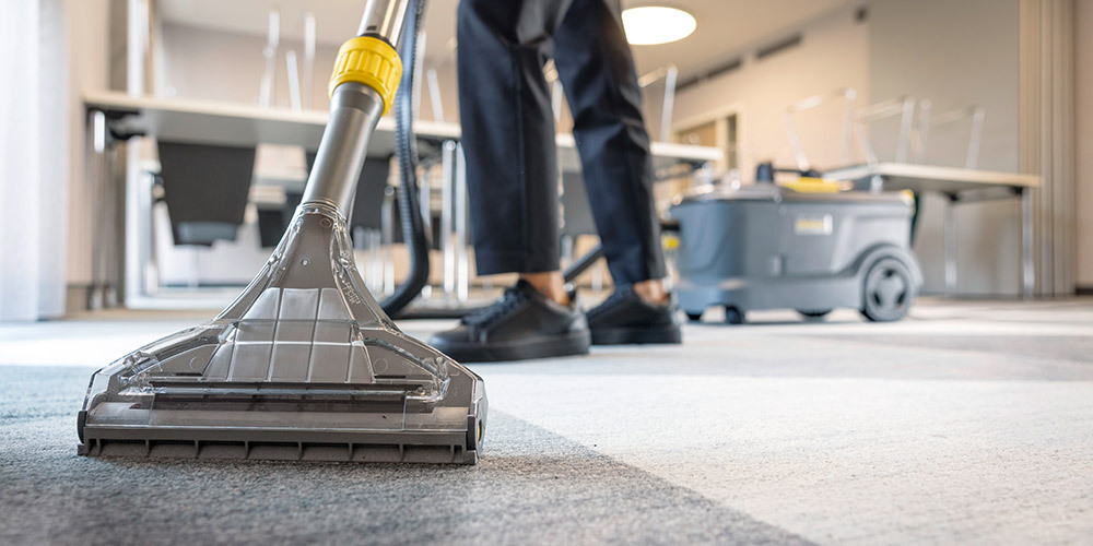 Extractors used in public buildings A close-up of a carpet extractor in use in a lobby