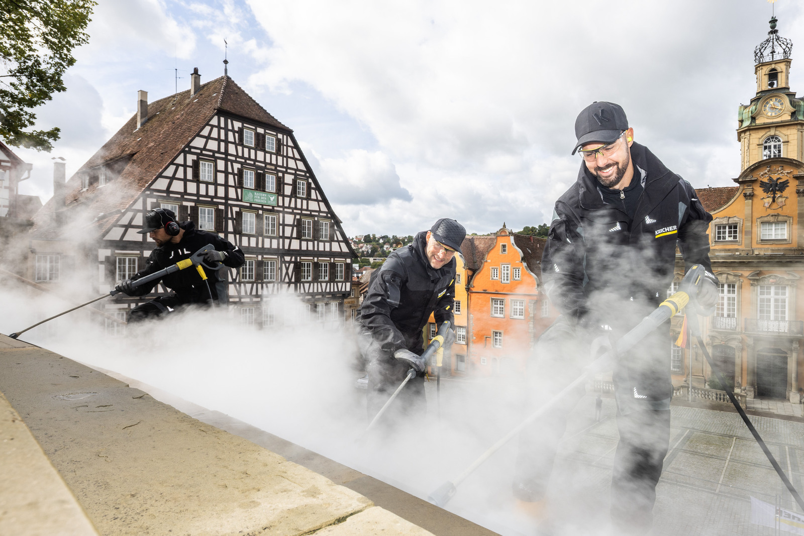 Kärcher employees clean staircase in Schwäbisch Hall. Kärcher employees clean staircase in Schwäbisch Hall.