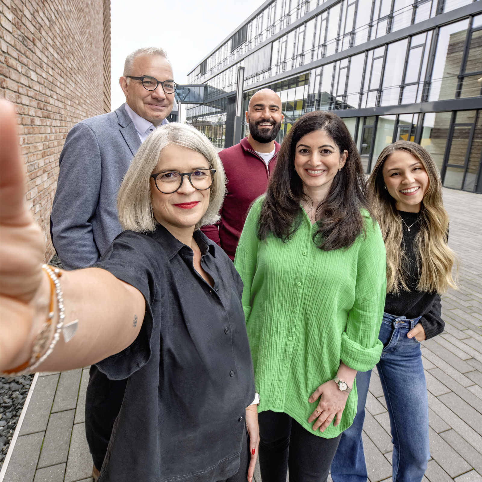 Values A group of Kärcher employees take a selfie