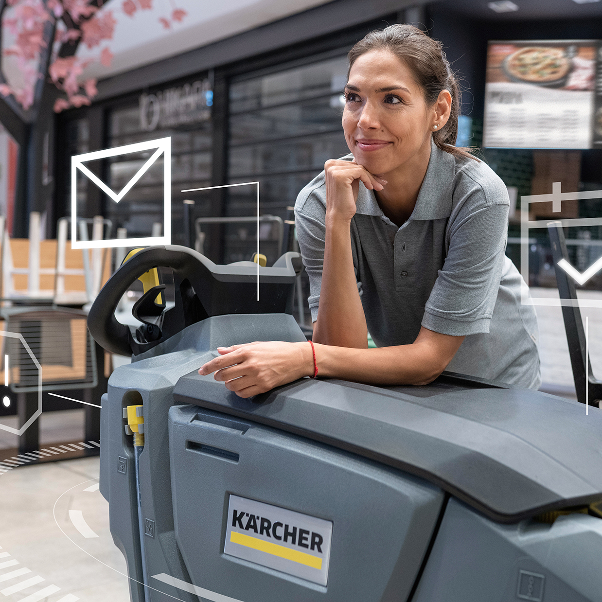 Reinigungskraft mit vebundener Scheuersaugmaschine