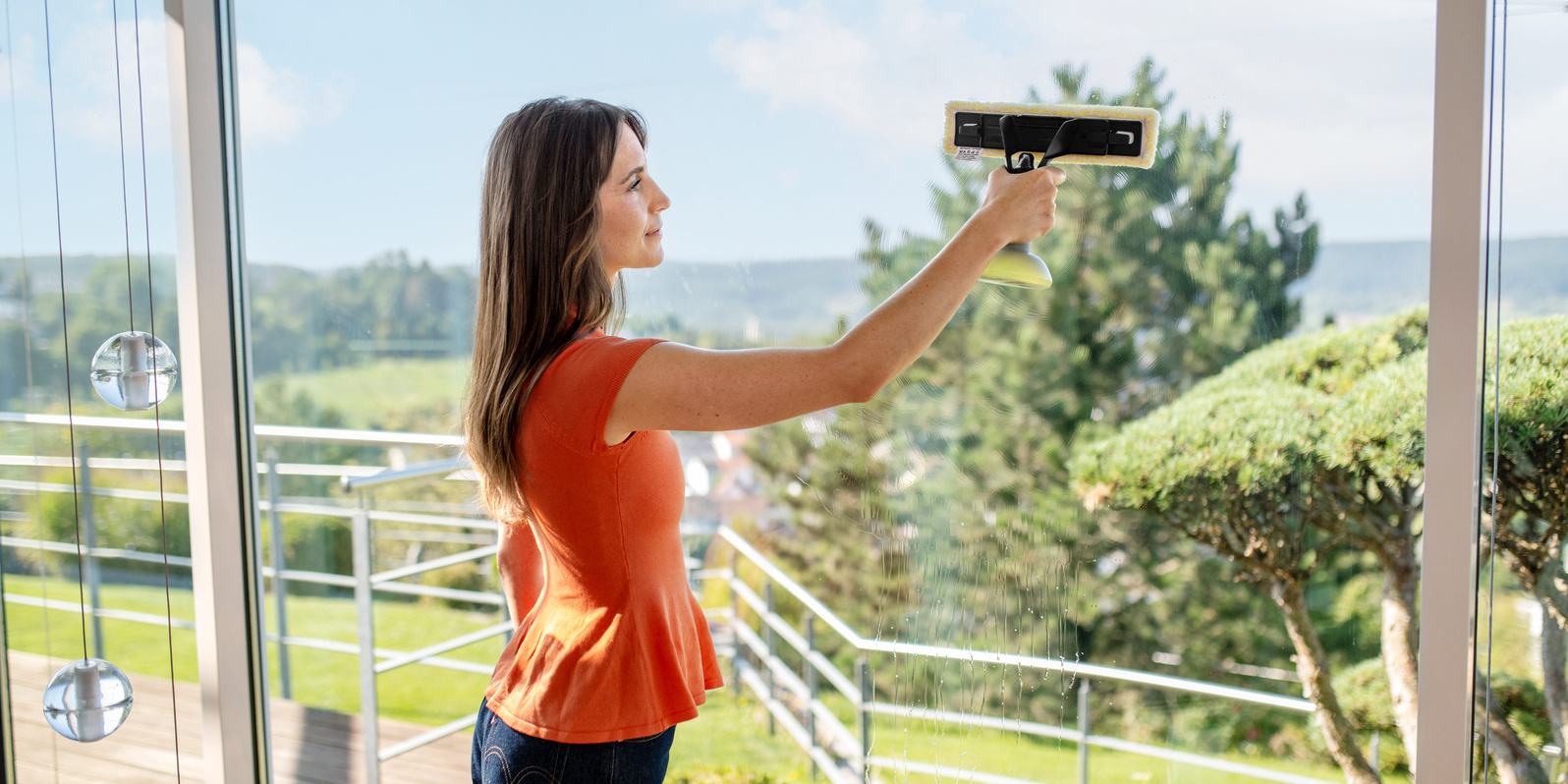 Clean glass pane with the spray bottle attachment.