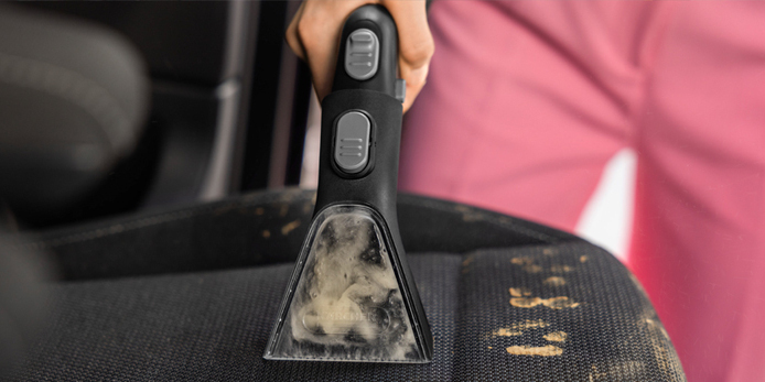 Floor mats are cleaned with a Kärcher interior cleaner