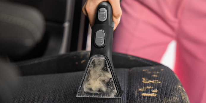 Floor mats are cleaned with a Kärcher interior cleaner