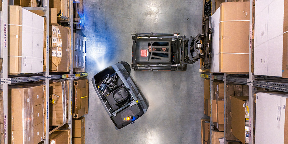 Overhead photo of the KIRA B 200 autonomous floor scrubber.