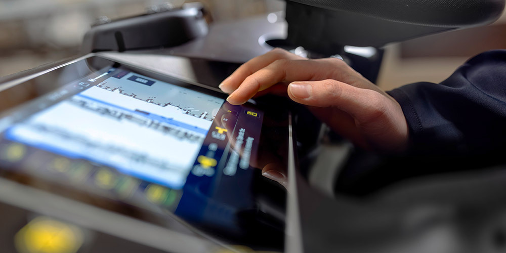 A well-lit touchscreen panel allows the machine operator to develop a cleaning route.