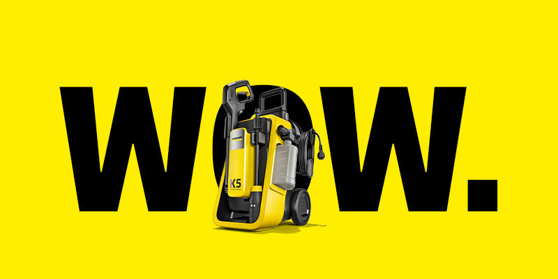 Pressure washer in front of the word WOW