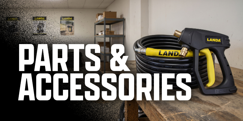 A collection of Landa pressure washer accessories sit on a table.